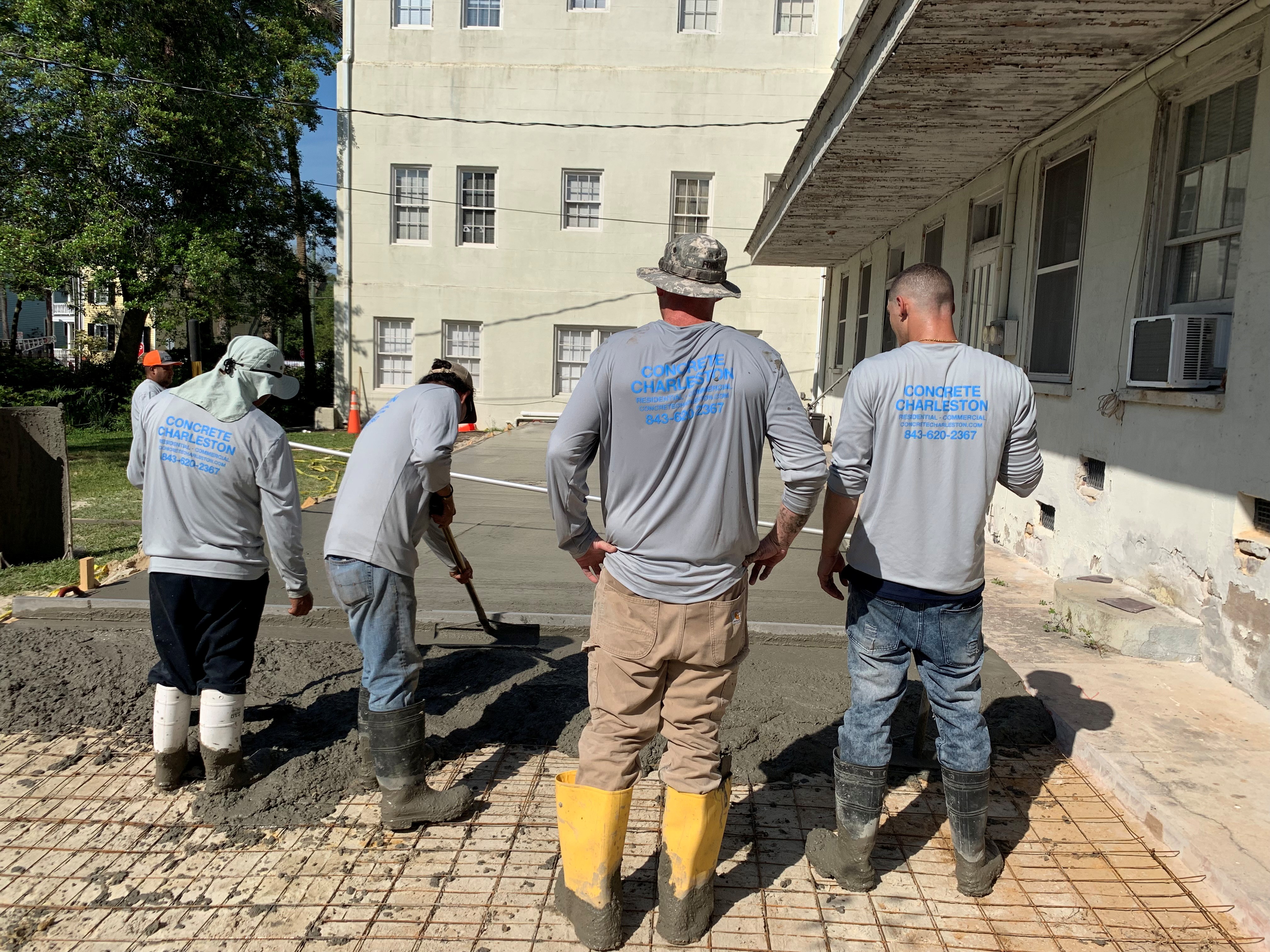 Exposed aggregate concrete finish in Charleston Lowcountry showing decorative pebble texture, natural stone appearance, slip-resistant surface for driveway or patio application