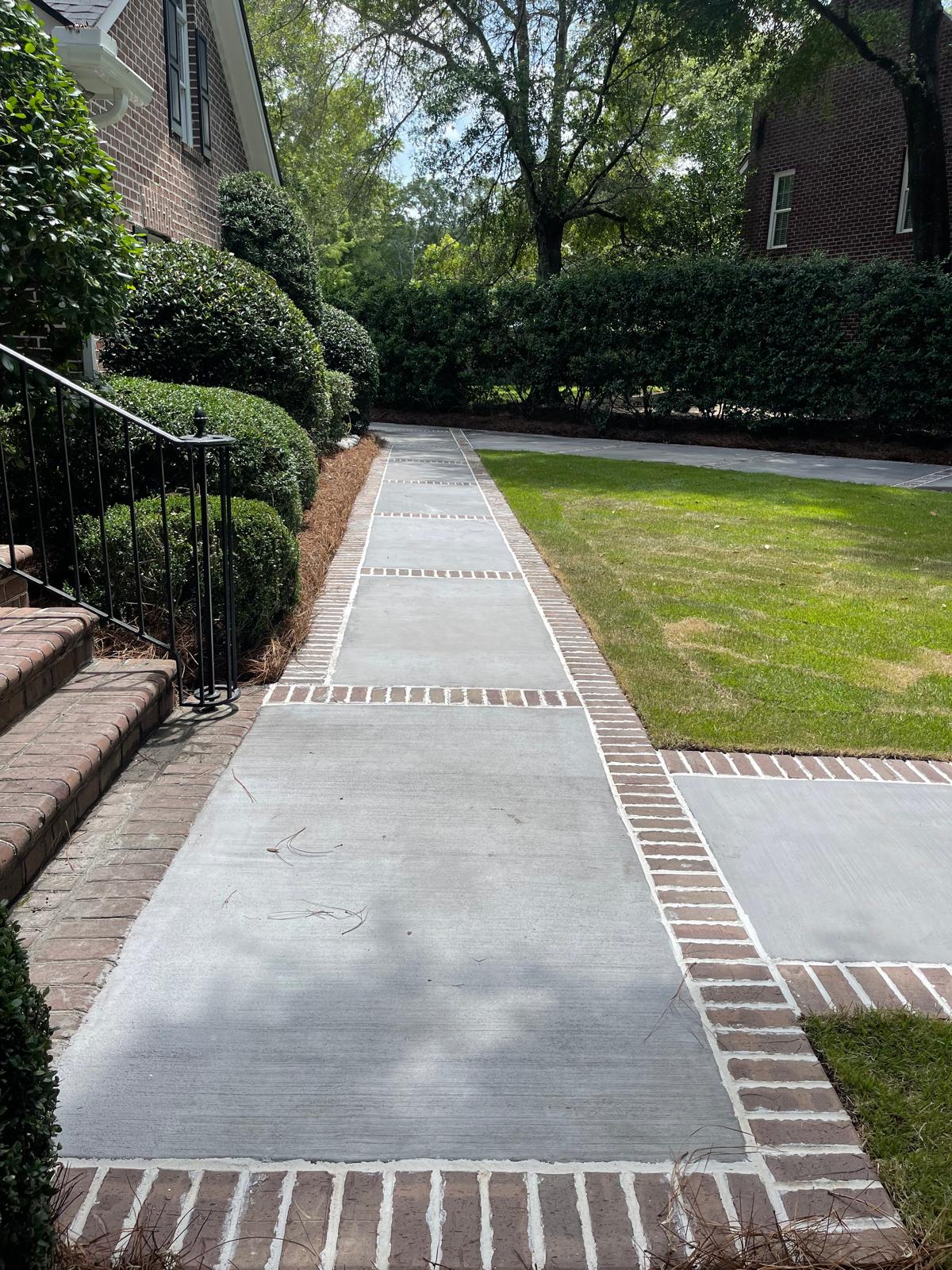 Acid Stained Concrete Mount Pleasant - Custom Color Decorative Flooring Acid stained concrete floor in Mount Pleasant SC with variegated earth tone colors, reactive chemical staining creating unique marbled effect, diamond ground surface preparation, penetrating sealer for protection, low VOC eco-friendly stain application, suitable for residential and commercial interiors, humidity resistant finish for Charleston coastal climate