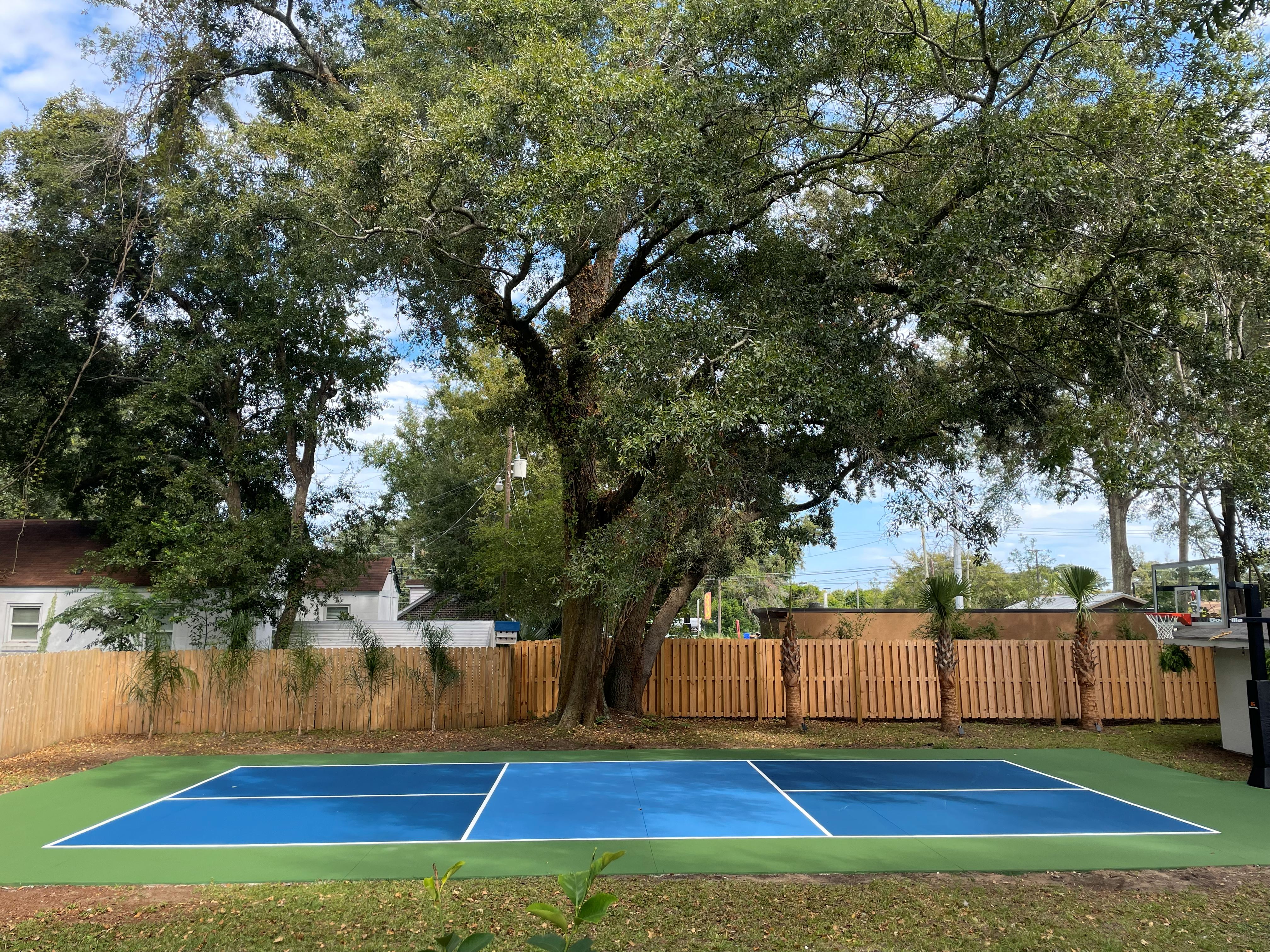 Professional concrete team working on driveway installation