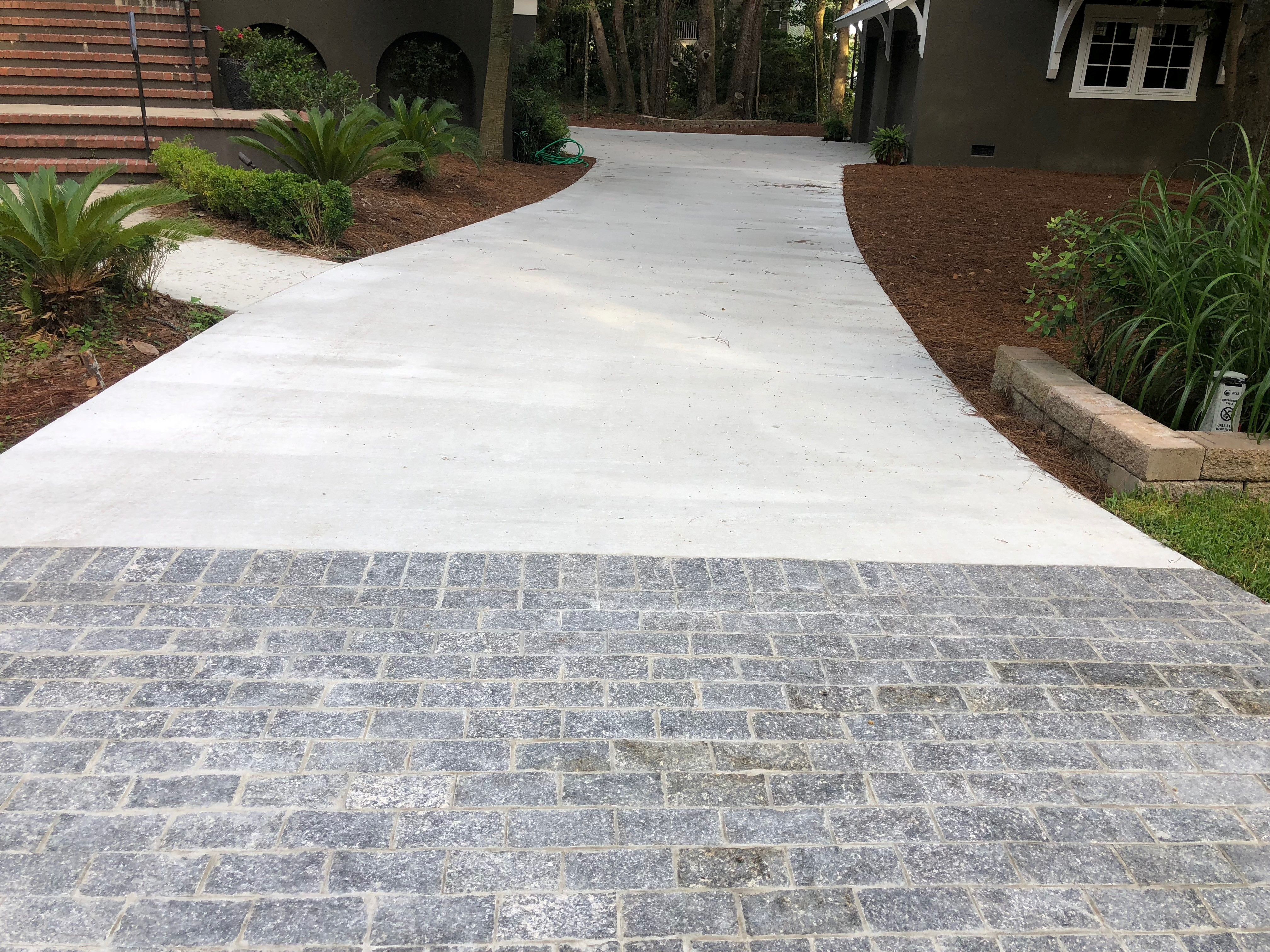 Acid Stained Artistic Concrete West Ashley - Custom Multi-Color Decorative Floor Acid stained decorative concrete in West Ashley SC with artistic multi-color design, reactive chemical staining in copper, turquoise and amber tones, hand-applied stain for custom color blending, diamond polished surface, penetrating sealer with matte finish, unique variegated patterns, eco-friendly water-based stains, humidity resistant for Charleston climate, artistic residential flooring