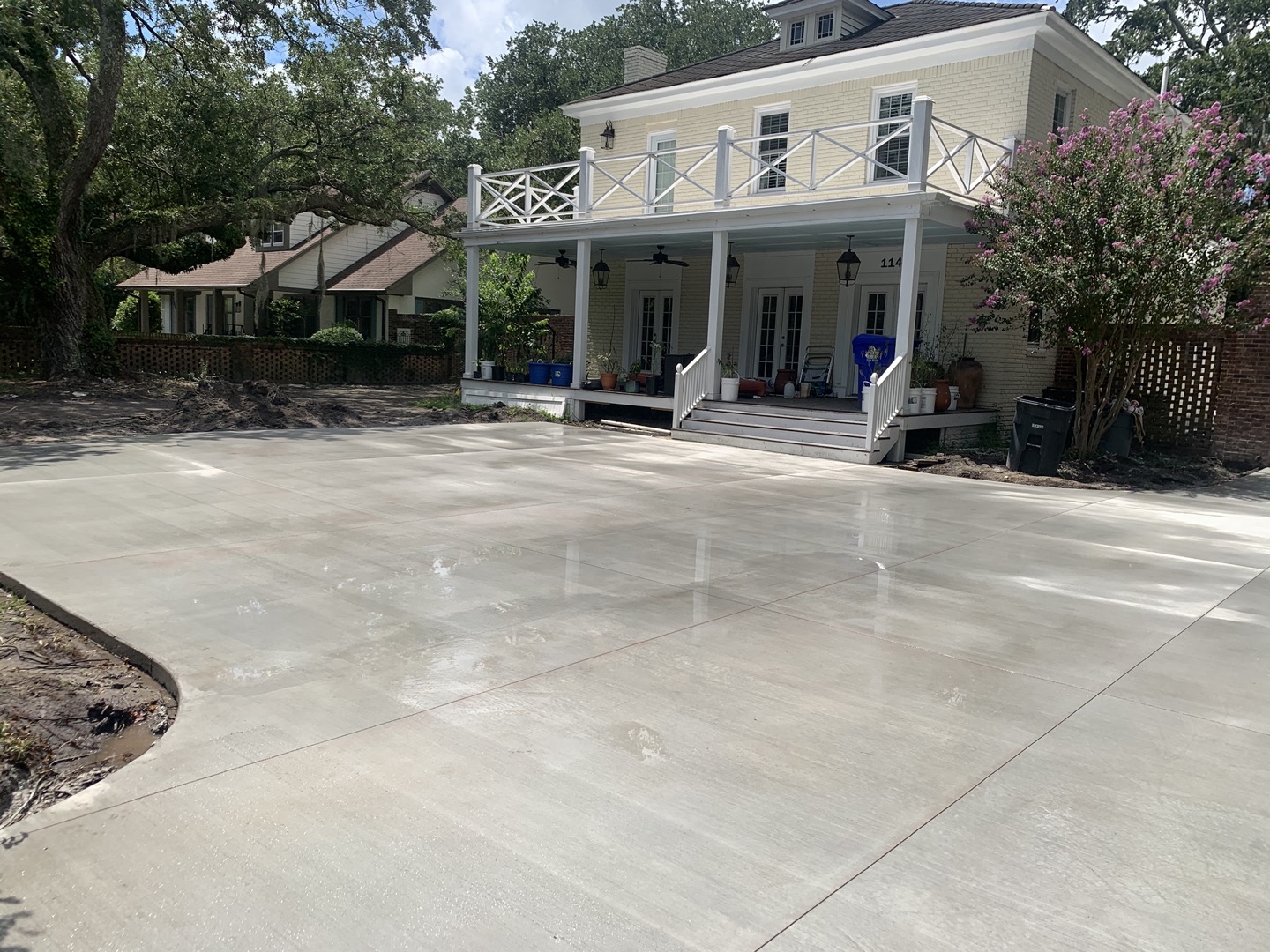 Decorative Saw Cut Concrete Driveway - North Charleston SC Decorative saw cut concrete driveway in North Charleston SC with geometric diamond pattern saw cuts, contrasting color-filled joints, modern design aesthetic, reinforced concrete construction, and professional installation for contemporary residential property in South Carolina