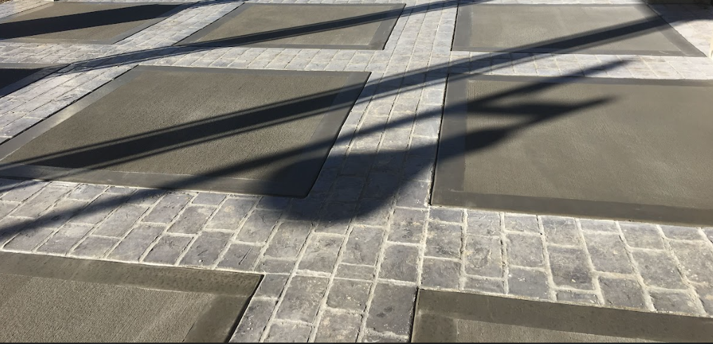 Polished Concrete Showroom North Charleston - High-Gloss Commercial Flooring Polished concrete showroom floor in North Charleston SC with high-gloss reflective finish, mechanically polished to 3000 grit, lithium densifier treatment for hardness, exposed aggregate with decorative scoring patterns, stain-resistant topical sealer, low maintenance commercial flooring, modern aesthetic for retail and office spaces, humidity resistant for coastal climate