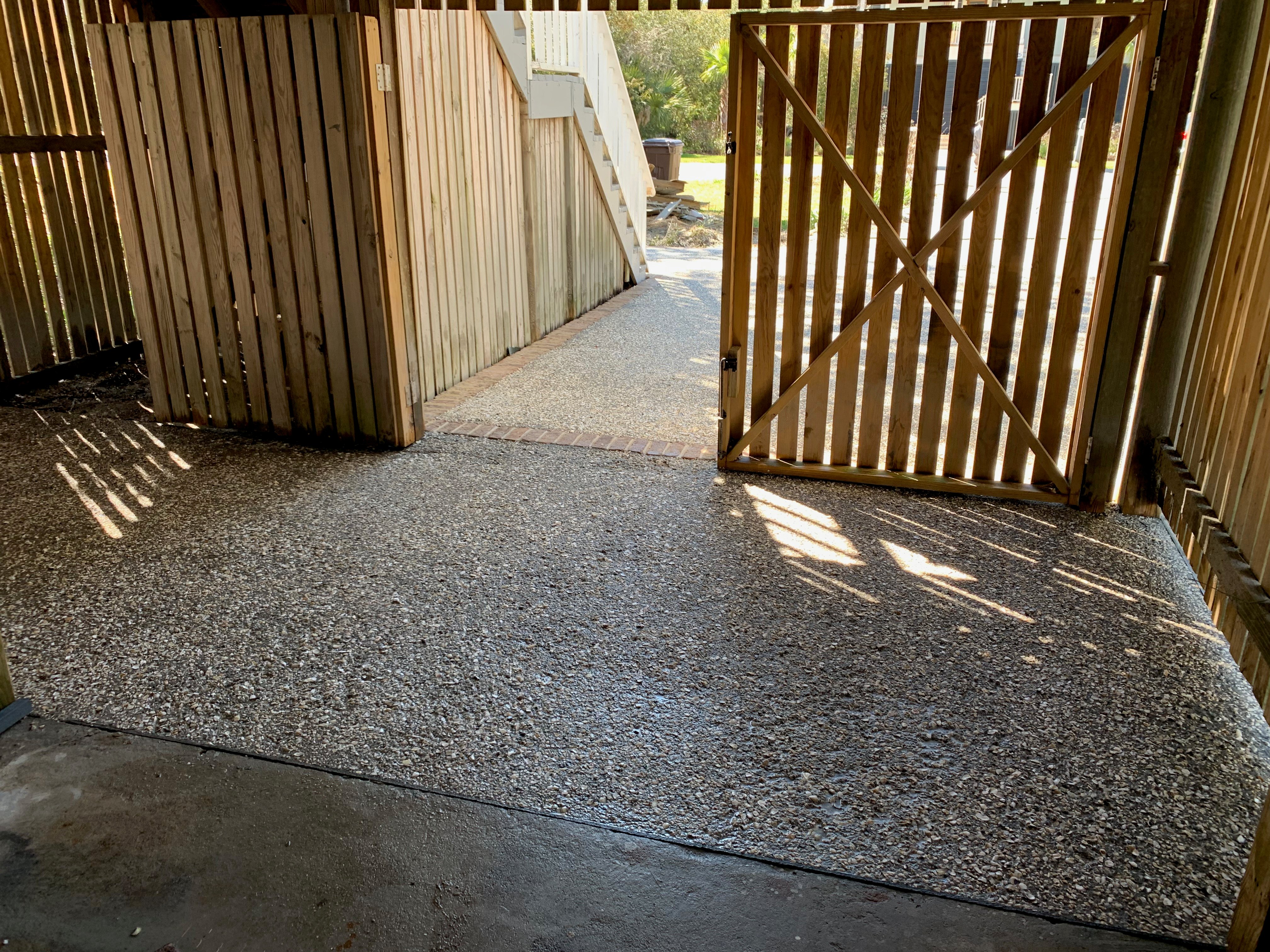 Decorative Pool Deck Daniel Island - Stamped Concrete with Cool Deck Coating Decorative concrete pool deck in Daniel Island SC with travertine stone texture, cool deck coating for barefoot comfort, slip-resistant surface finish, integral buff color with antiquing stain, 4 inch thickness with steel reinforcement, chlorine and salt water resistant sealer, proper drainage away from pool, UV protection for Charleston sun exposure, elegant outdoor living space