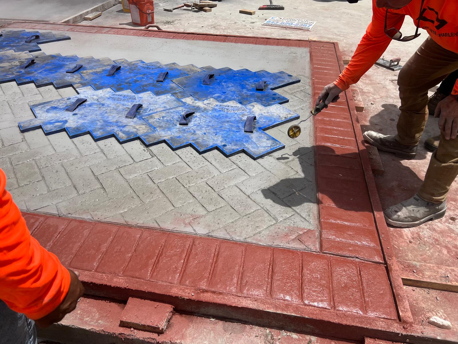 Stamped vs Regular Concrete Comparison - Charleston SC Detailed comparison of stamped concrete with decorative brick pattern versus plain regular concrete surface in Charleston SC, showing aesthetic differences, texture options, color variations, and design possibilities for residential and commercial properties