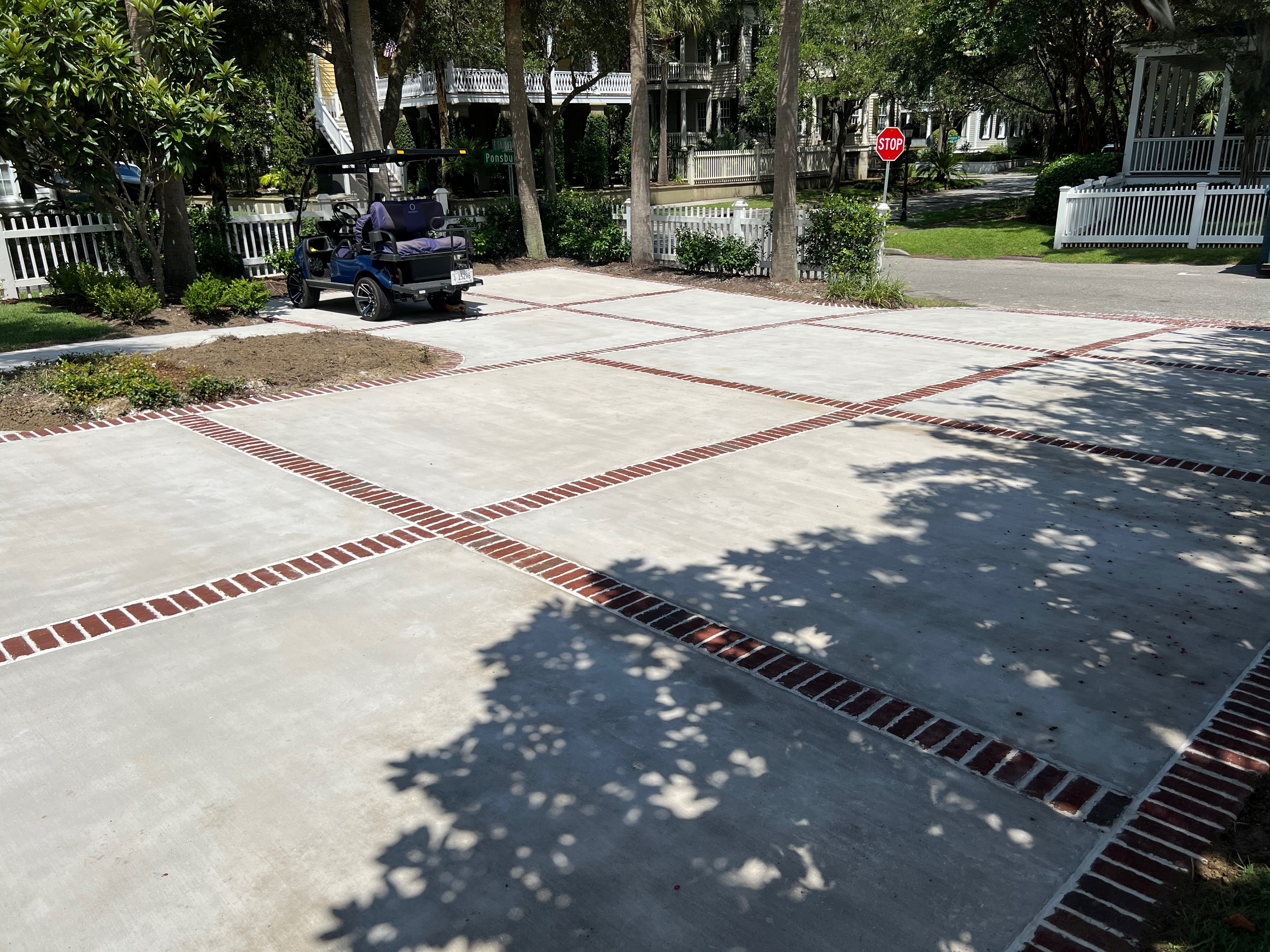 Polished Concrete Flooring Charleston - Commercial Decorative Concrete Polished concrete floor in Charleston SC commercial space with high-gloss finish, mechanically densified surface using lithium silicate hardener, 3000-grit diamond polishing for mirror-like shine, exposed aggregate with decorative saw cuts, stain-resistant sealer, low maintenance flooring, humidity resistant for coastal climate, modern industrial aesthetic for retail showroom