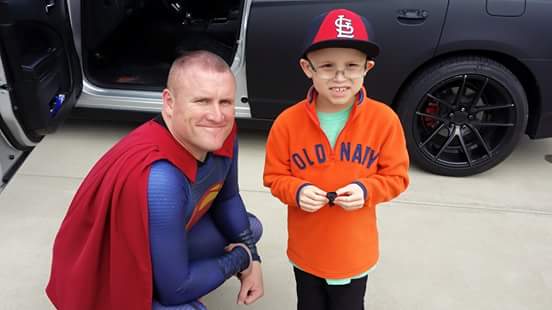 Superhero visit with sick child