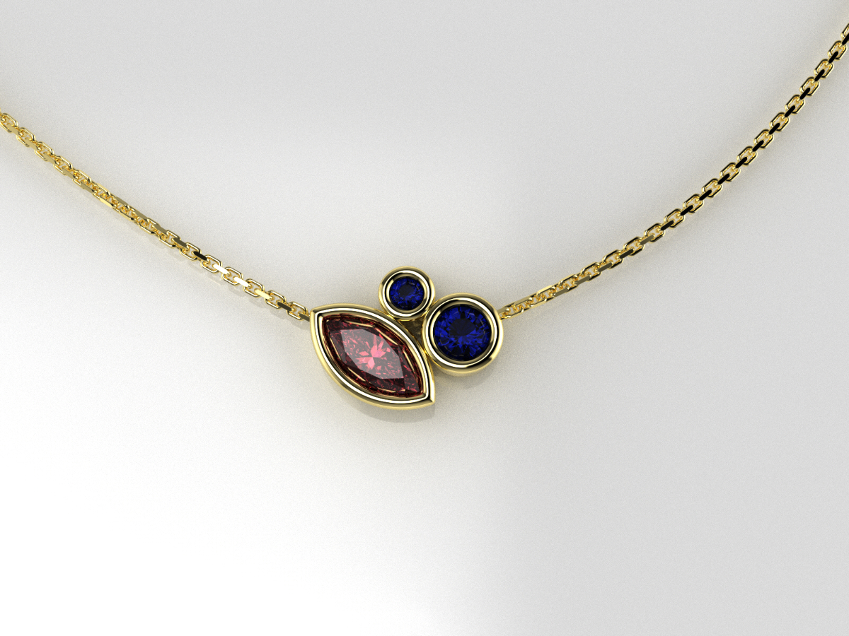 Custom gold garnet and sapphire pendant necklace handcrafted at Q Jewelers San Antonio