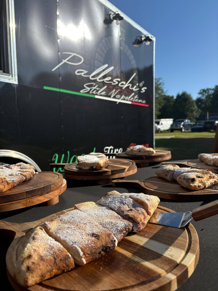 Mobile pizza oven with fresh calzones