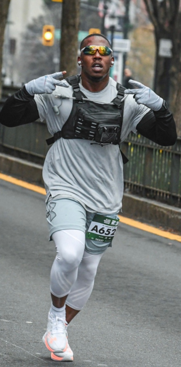 Coach running the monthly 3K race in Atlanta, GA